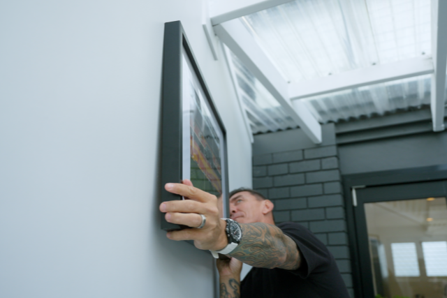 Hang a picture frame with Mat Rogers