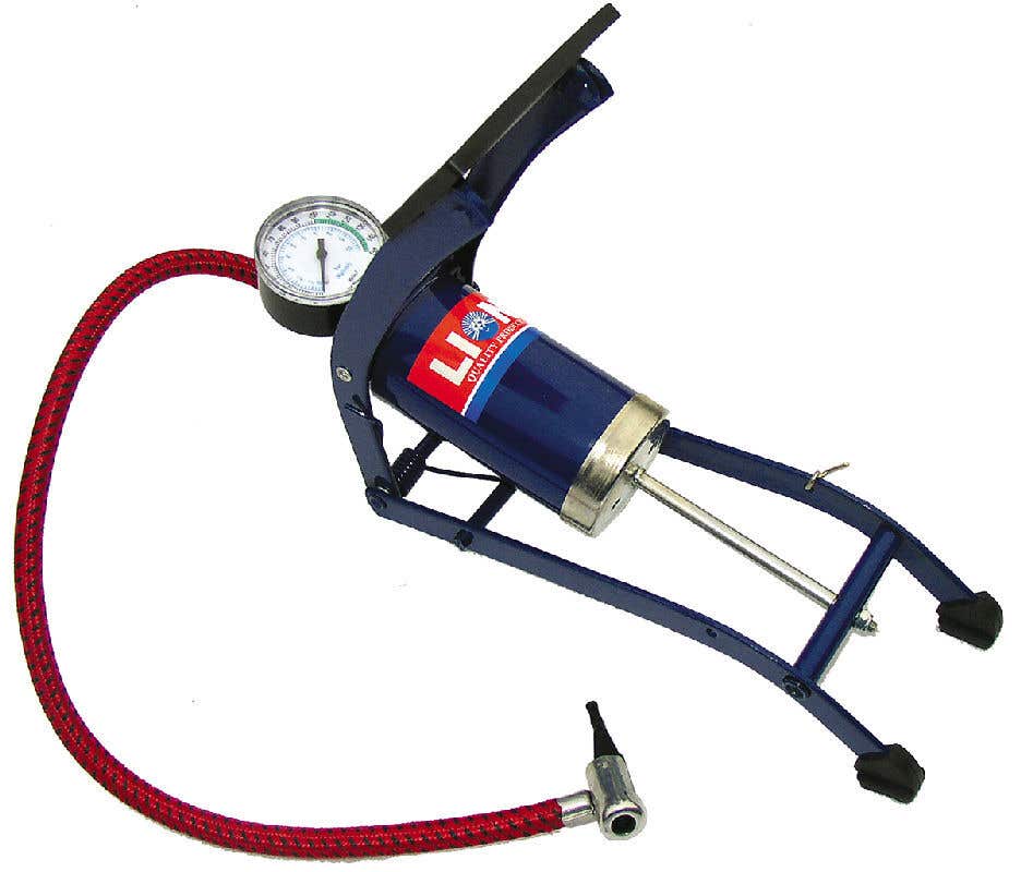 Bike foot pump with gauge outlet